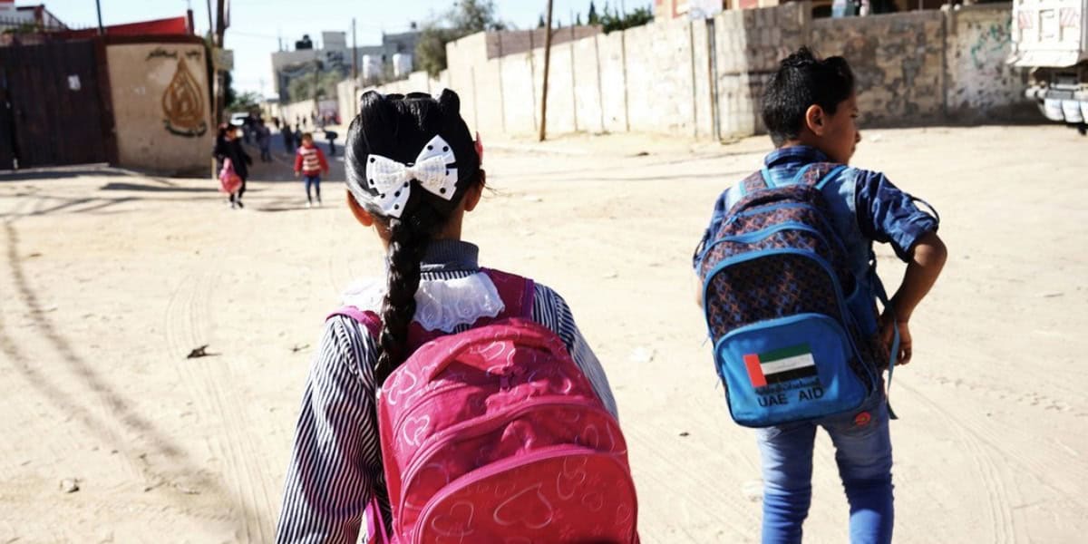 UNICEF/Loulou d’Aki Niños caminando hacia la escuela en Rafah, al sur de la Franja de Gaza