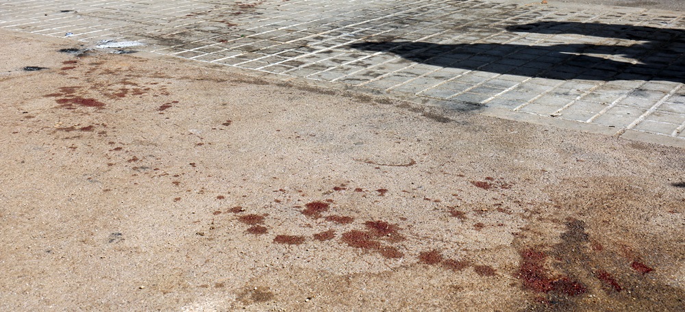 Restes de sang on va haver-hi el tiroteig.