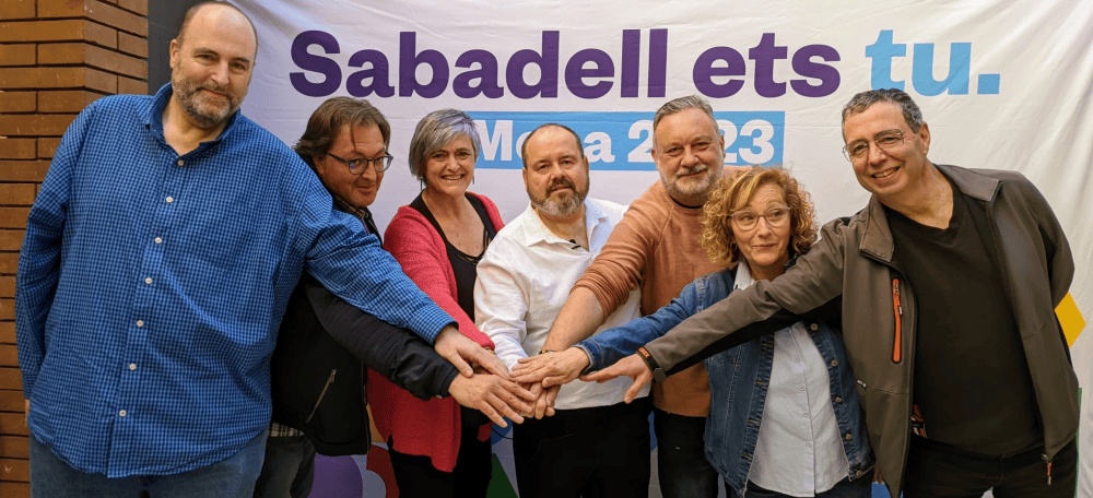 Foto portada: escenificació de l'acord entre En Comú Podem i Guanyem a les municipals. Autor: J.d.A.