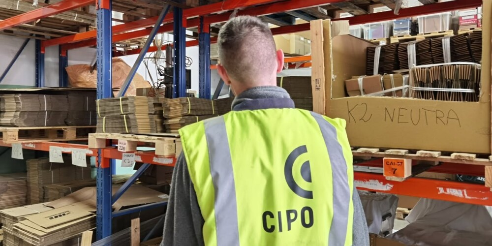 Foto de portada: Treballadors de CIPO a un taller