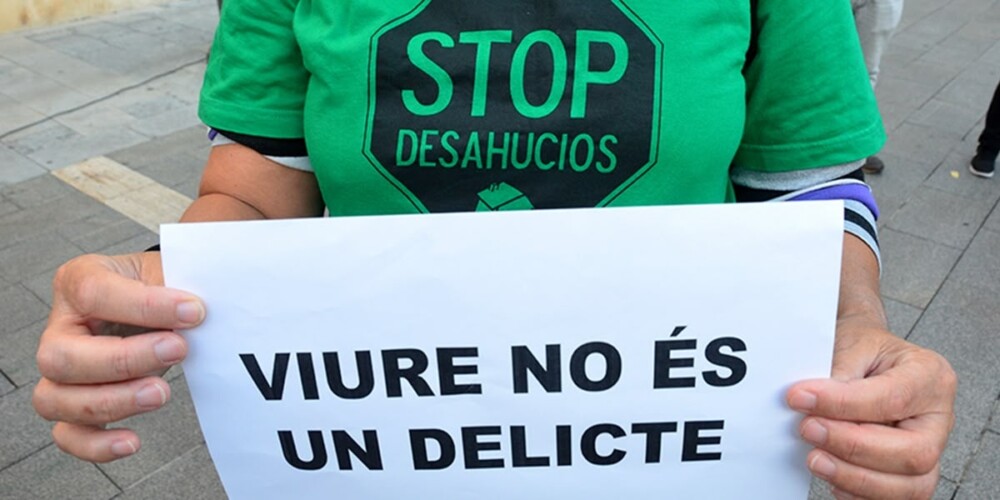 Foto portada: una activista pel dret a l'habitatge, en una imatge d'arxiu. Autor: David B.
